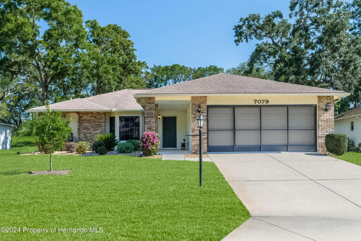 7079 CROWN OAKS DR, SPRING HILL, FL 34606, photo 1 of 74
