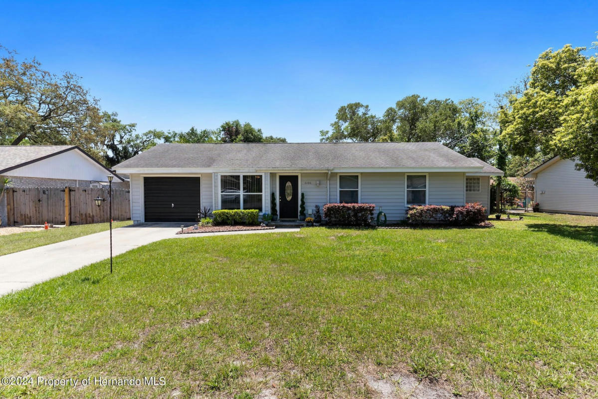 6186 PIEDMONT DR, SPRING HILL, FL 34606, photo 1 of 55