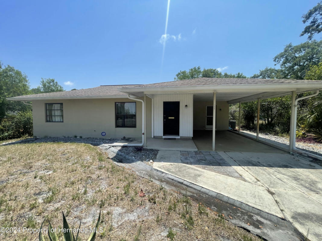 7056 SPRING HILL DR, SPRING HILL, FL 34606, photo 1 of 8