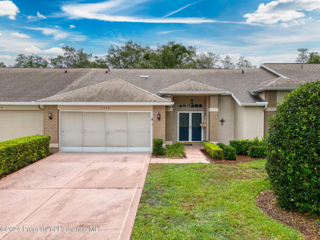 7348 WILLOW BROOK DR, SPRING HILL, FL 34606, photo 1 of 83